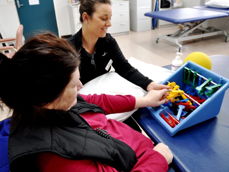OT Katie White with stroke patient (37) - send to Kathie Lowe - Copy